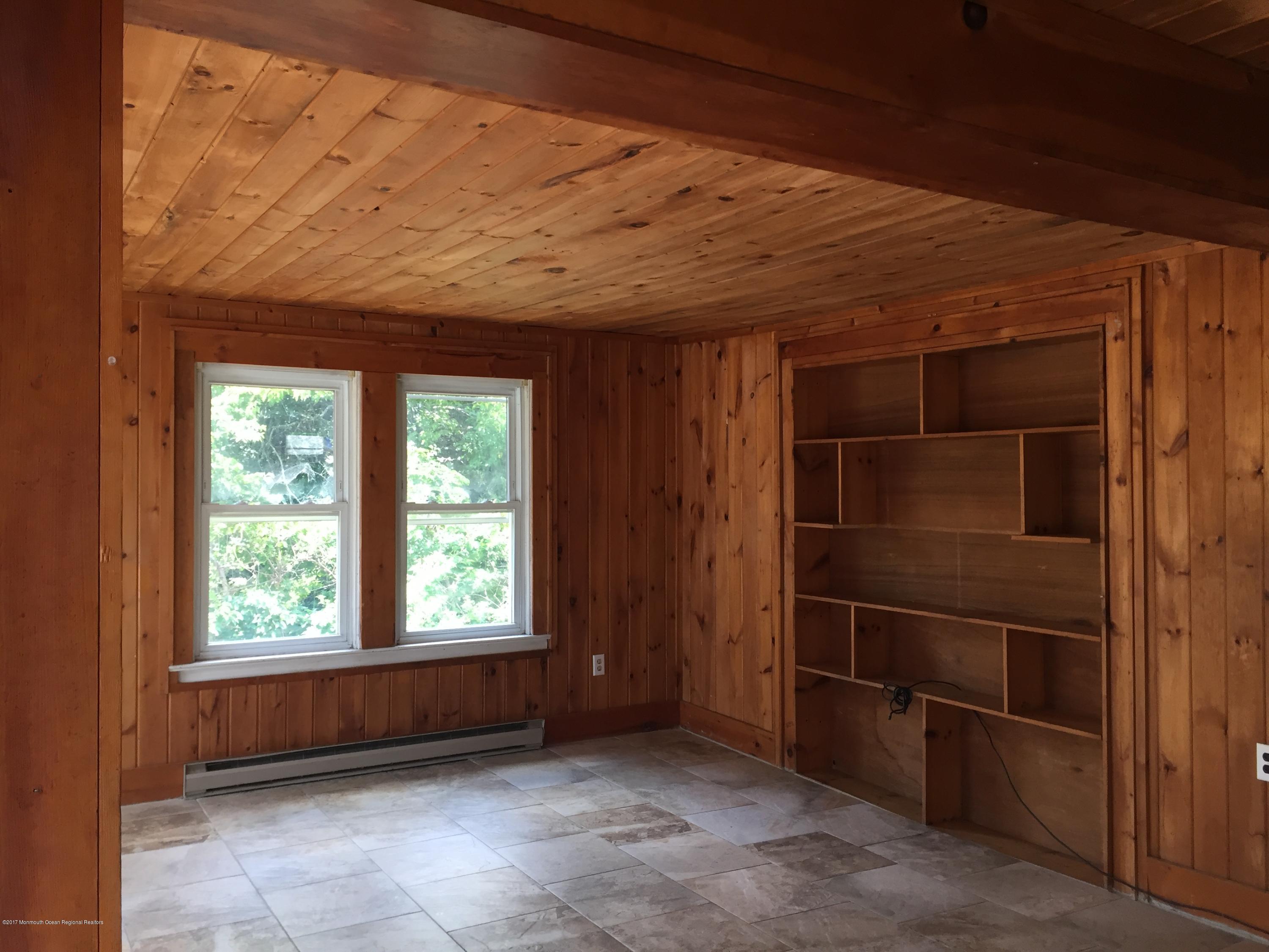 99 Main Street Toms River, NJ 08757 - Photo 3 of 17 an empty room with windows