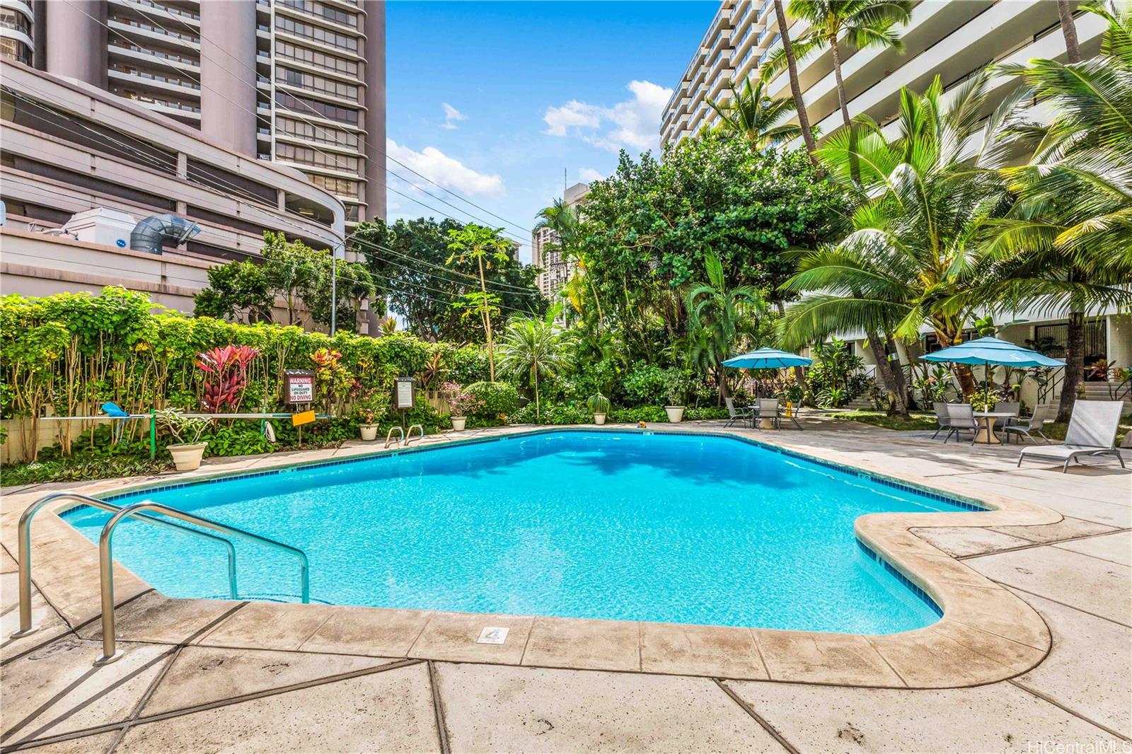425 Ena Road, Unit 706B Honolulu, HI 96815 - Photo 23 of 23 a view of a swimming pool with a patio