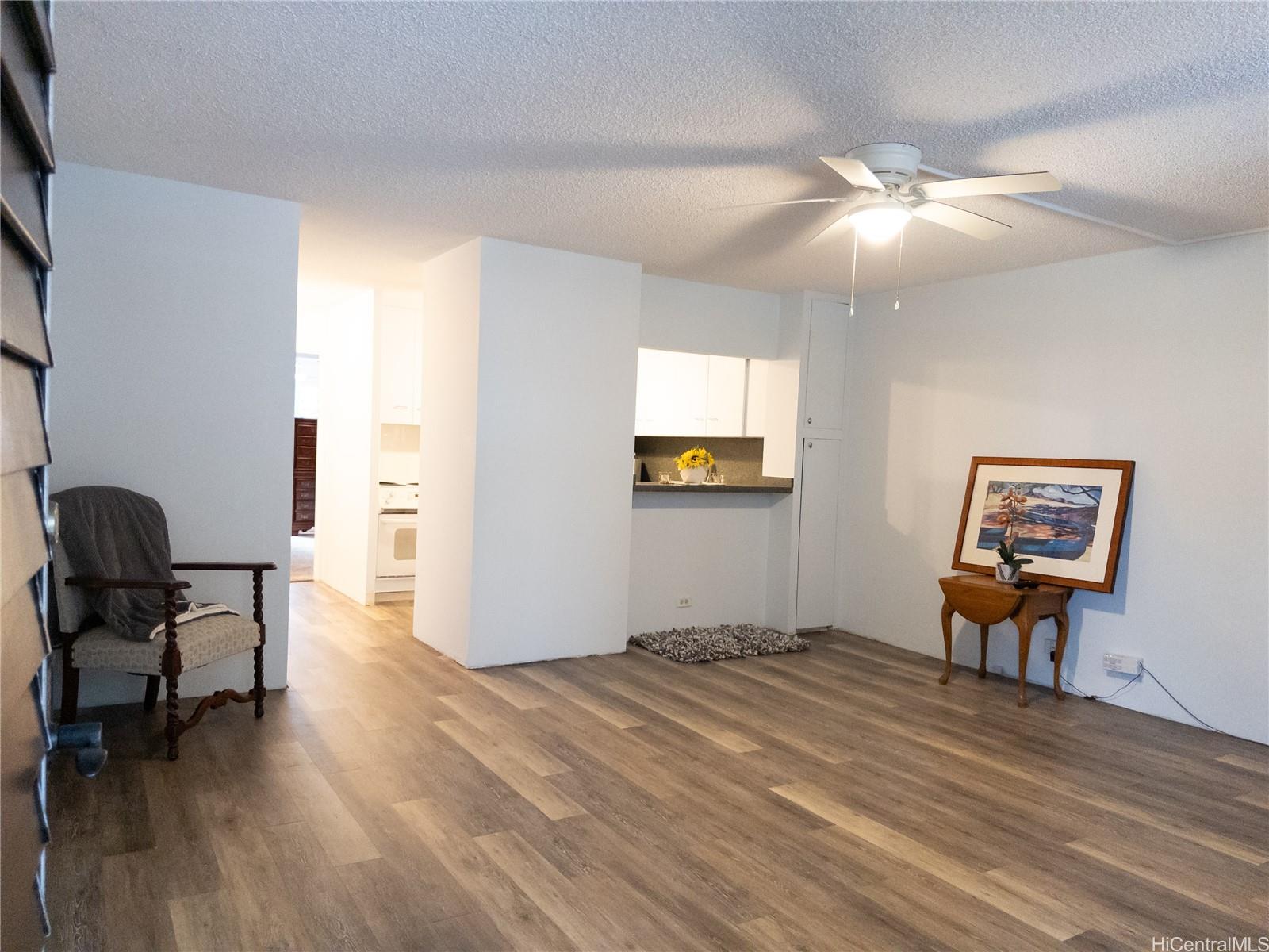 425 Ena Road, Unit 706B Honolulu, HI 96815 - Photo 9 of 23 a bedroom with furniture and a window