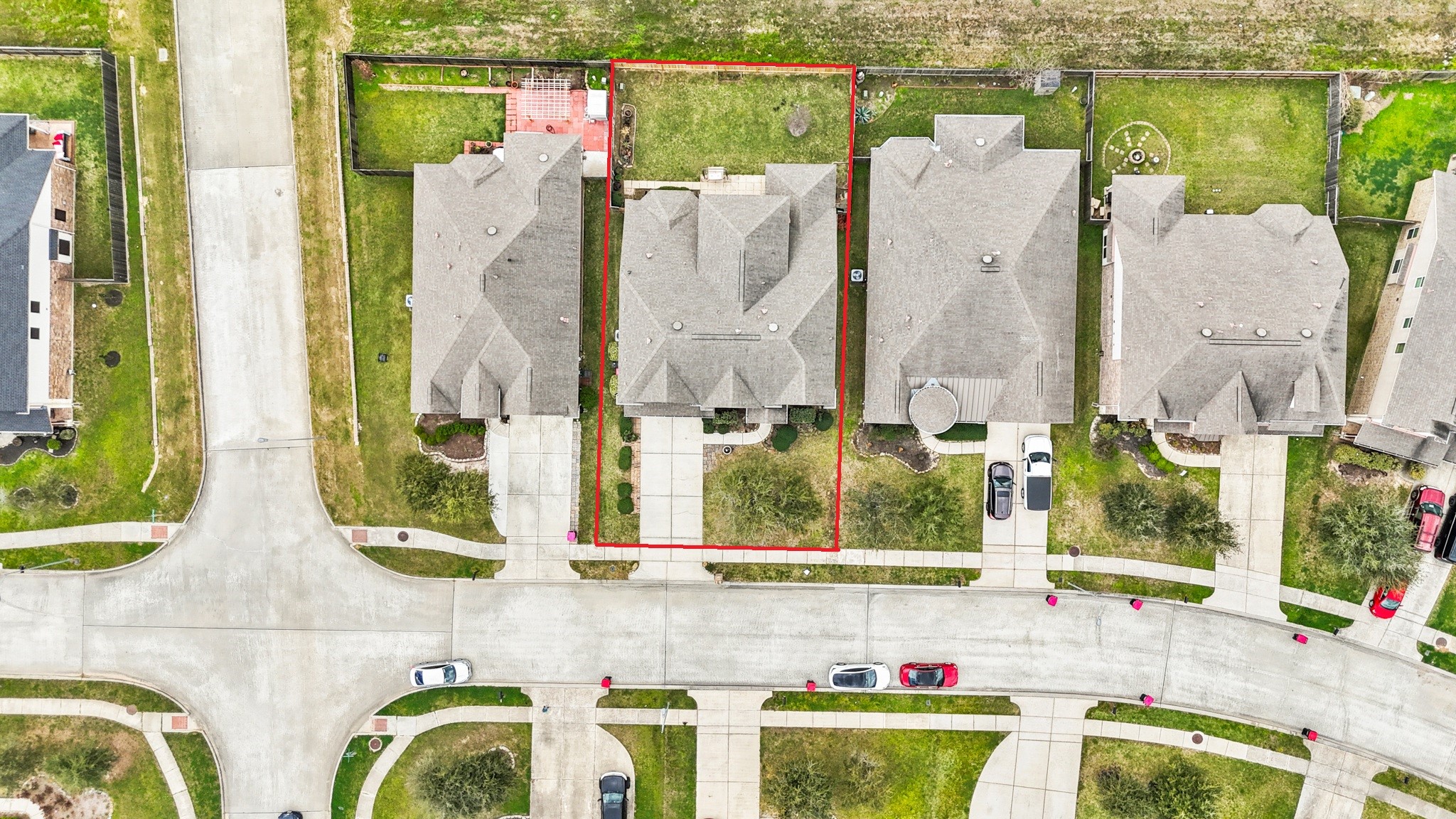 25407 Terrain Park Drive Spring, TX 77373 - Photo 4 of 33 Aerial perspective capturing the property’s generous 6,897 sqft lot and its peaceful neighborhood surroundings.