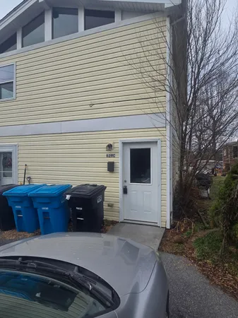 a view of kitchen with furniture and wooden floor