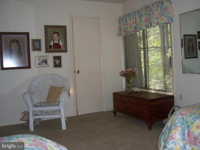 5248 West Running Brook Road, Unit 301 Columbia, MD 21044 - Photo 12 of 24 LARGE SECOND BEDROOM WITH WALK IN CLOSET.