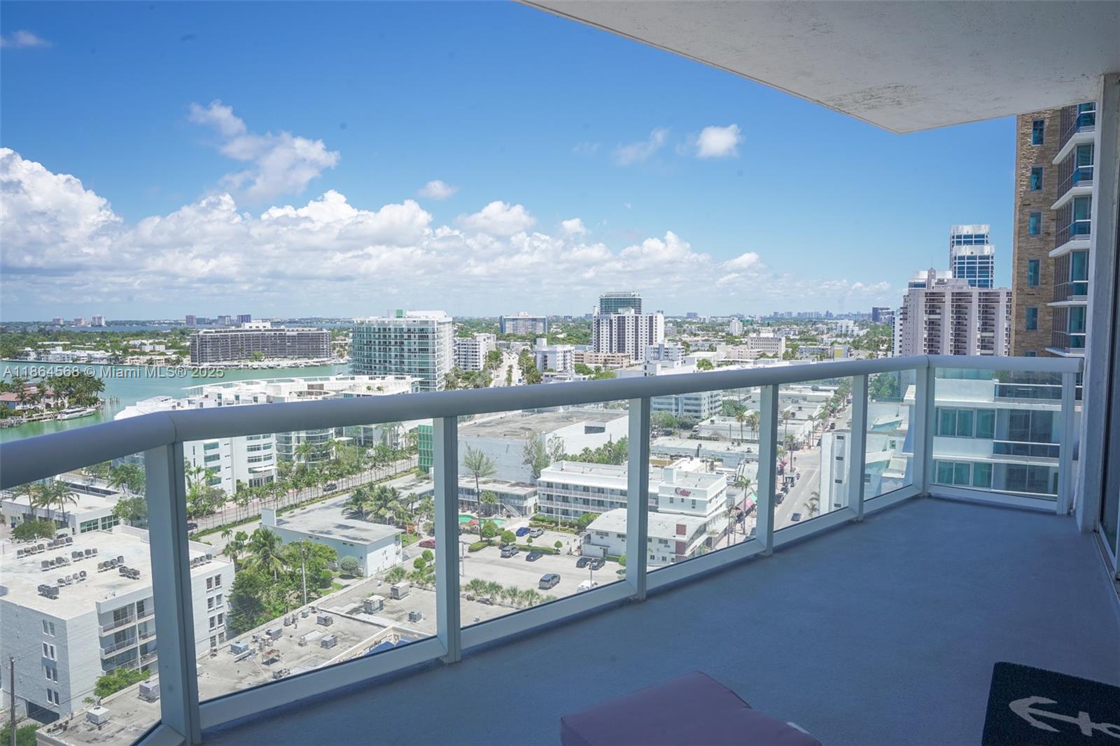 6515 Collins Avenue, Unit 1709 Miami Beach, FL 33141 - Photo 4 of 30 a view of city from a balcony