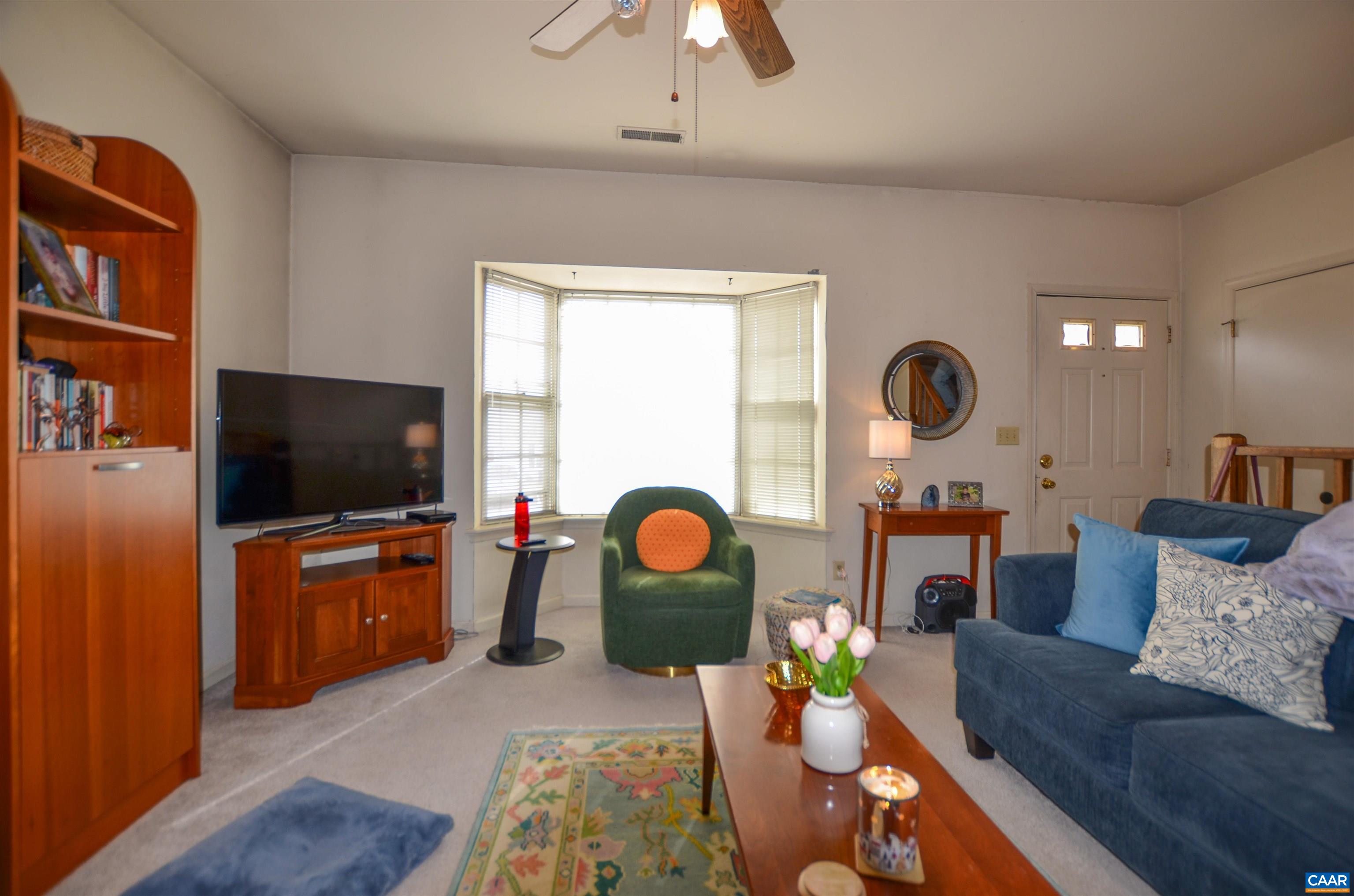 1594 Cool Spring Road Charlottesville, VA 22901 - Photo 2 of 26 a living room with furniture and a flat screen tv
