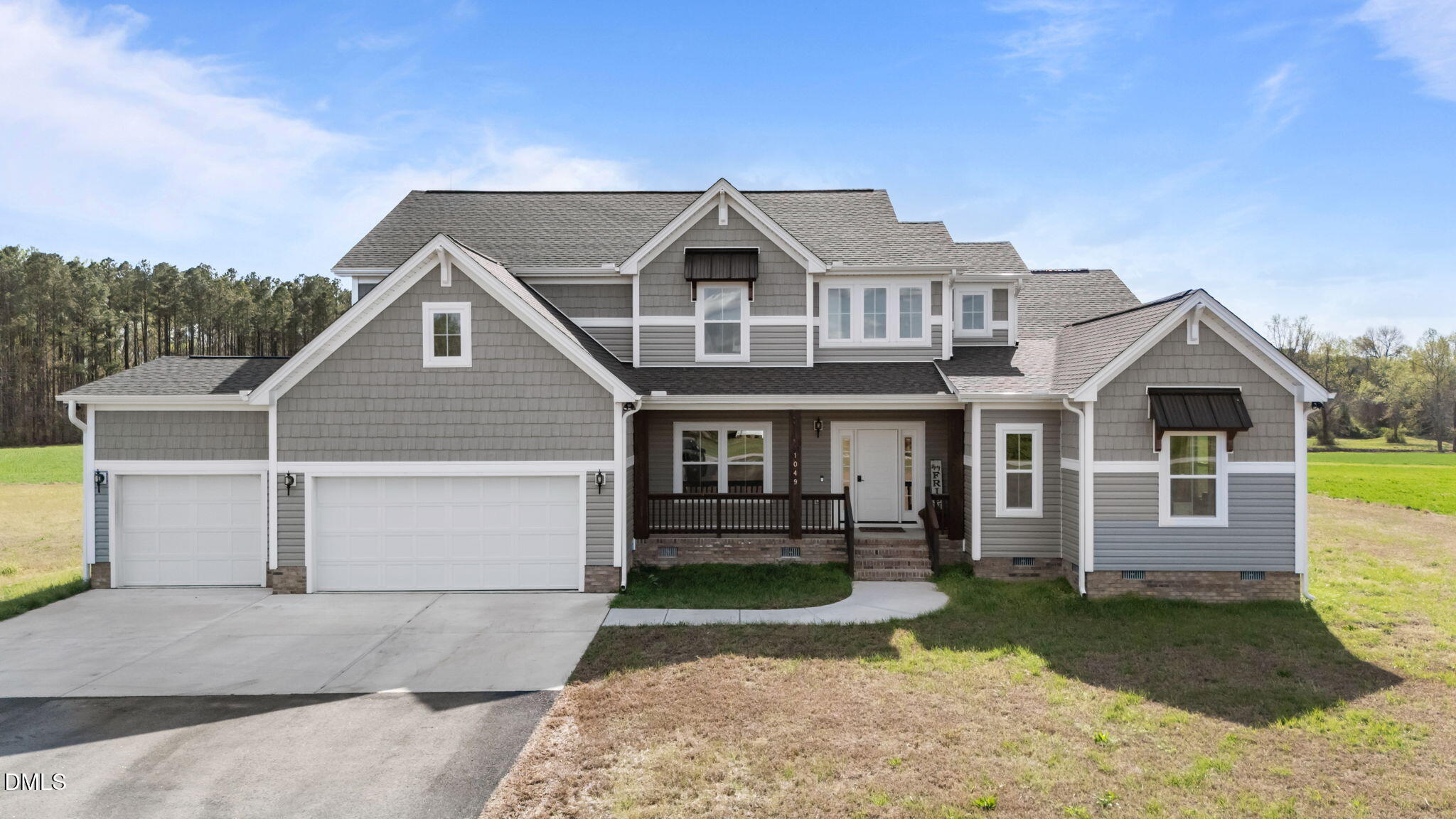 1049 Firetower Road Louisburg, NC 27549 - Photo 2 of 61 1-web-or-mls-01-DJI_20260323160036_0118_