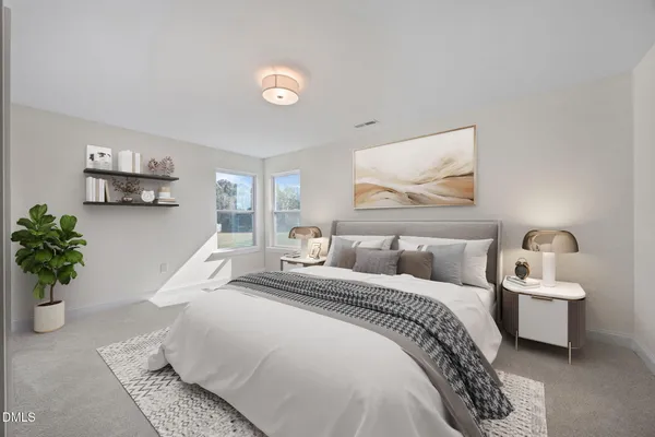 a bed room with a bed and a couch