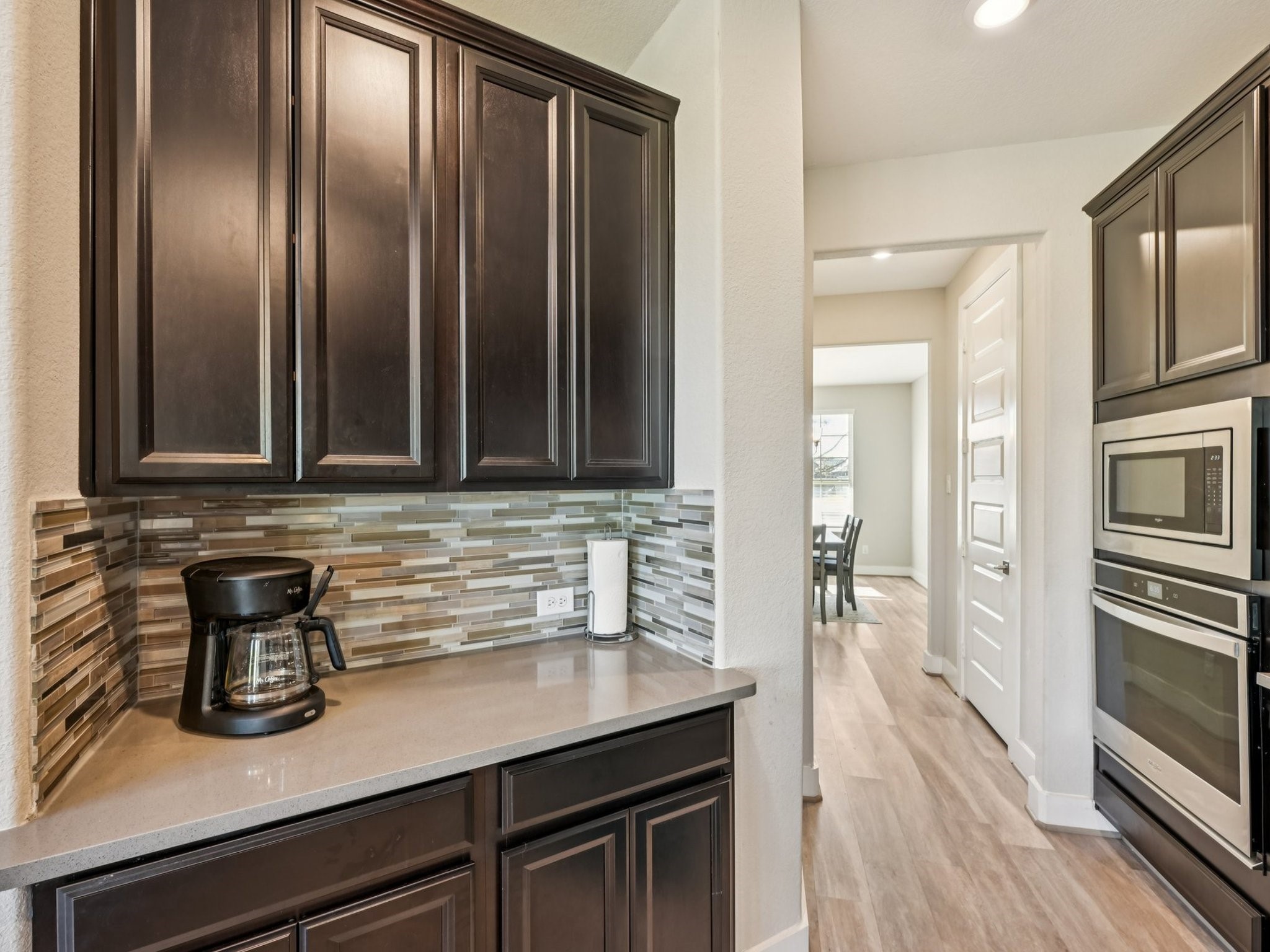2505 Hatton Terrace Lane Pearland, TX 77089 - Photo 17 of 44 a kitchen with a sink and a refrigerator