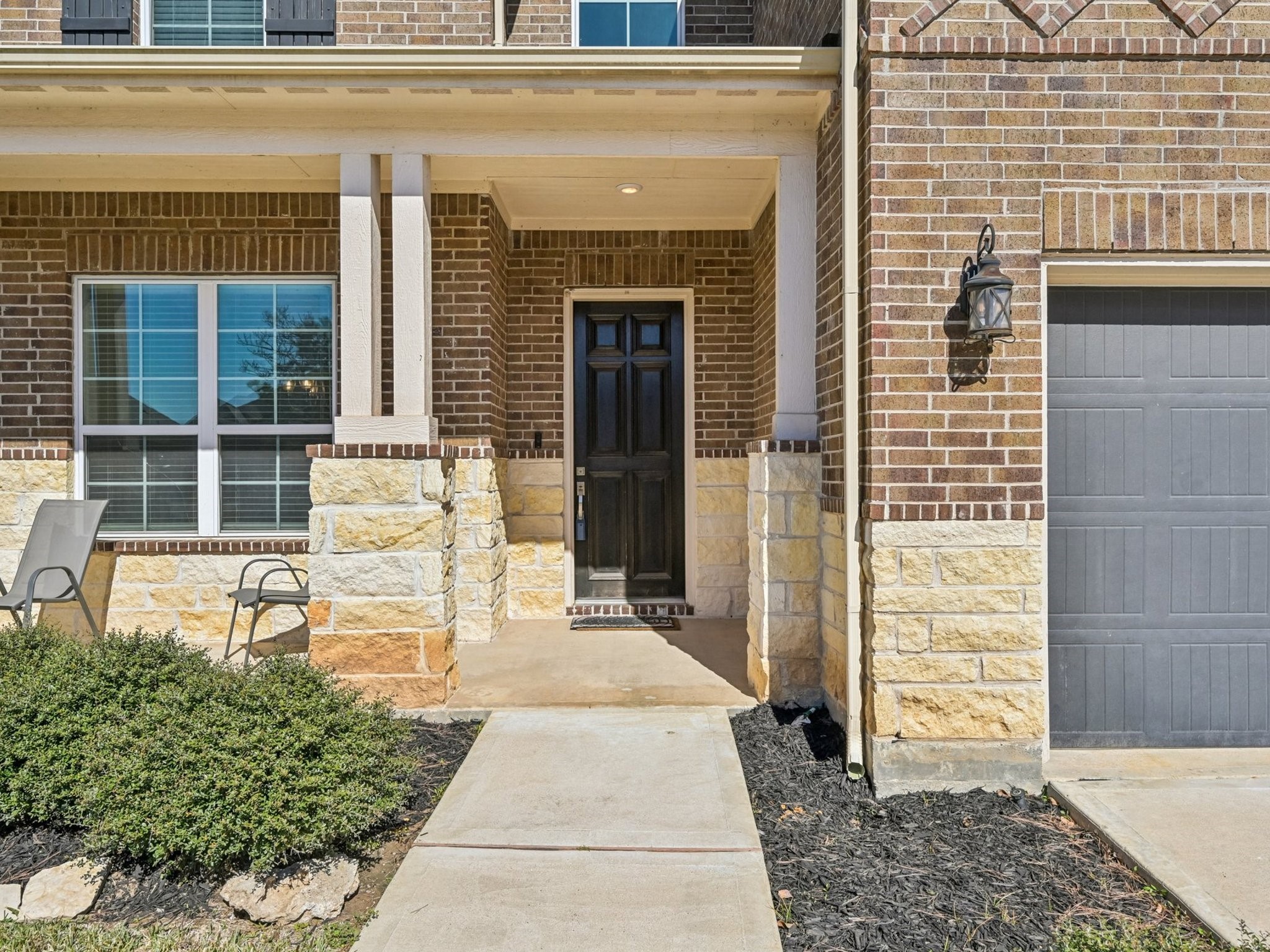 2505 Hatton Terrace Lane Pearland, TX 77089 - Photo 3 of 44 The covered porch is a great place to sit and have a cup of coffee.