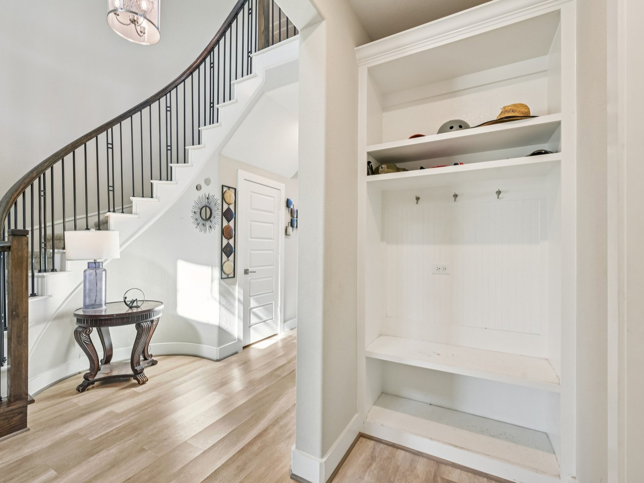 2505 Hatton Terrace Lane Pearland, TX 77089 - Photo 6 of 44 a view of entryway and hall with wooden floor