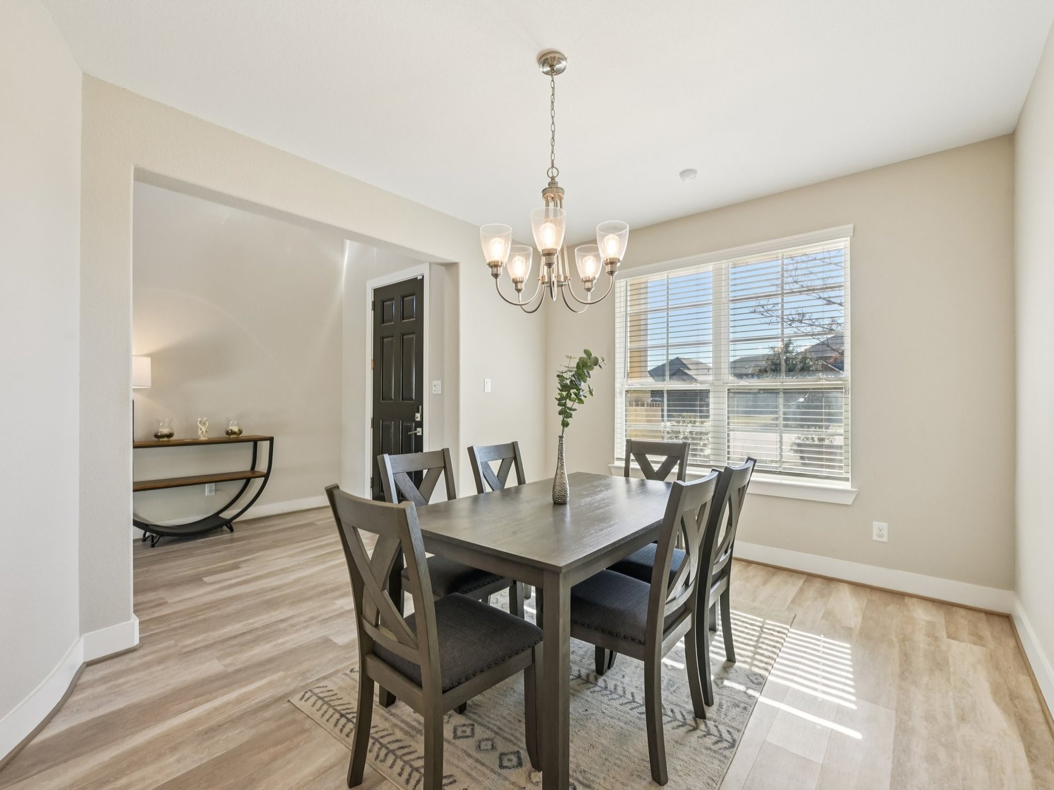 2505 Hatton Terrace Lane Pearland, TX 77089 - Photo 7 of 44 a view of a dining room with furniture and window