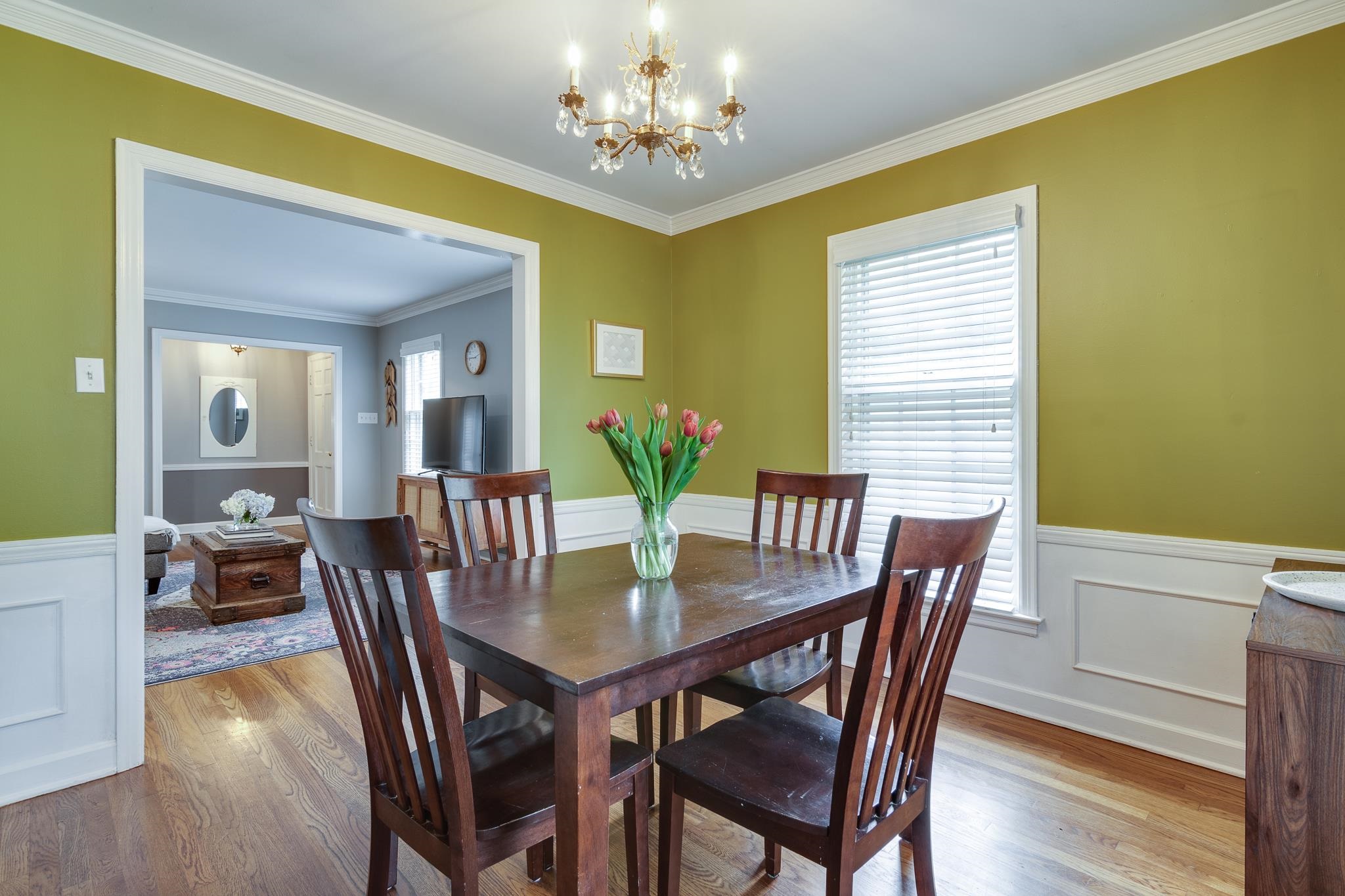 4892 Kaye Road Memphis, TN 38117 - Photo 5 of 17 a view of a dining room with furniture and wooden floor
