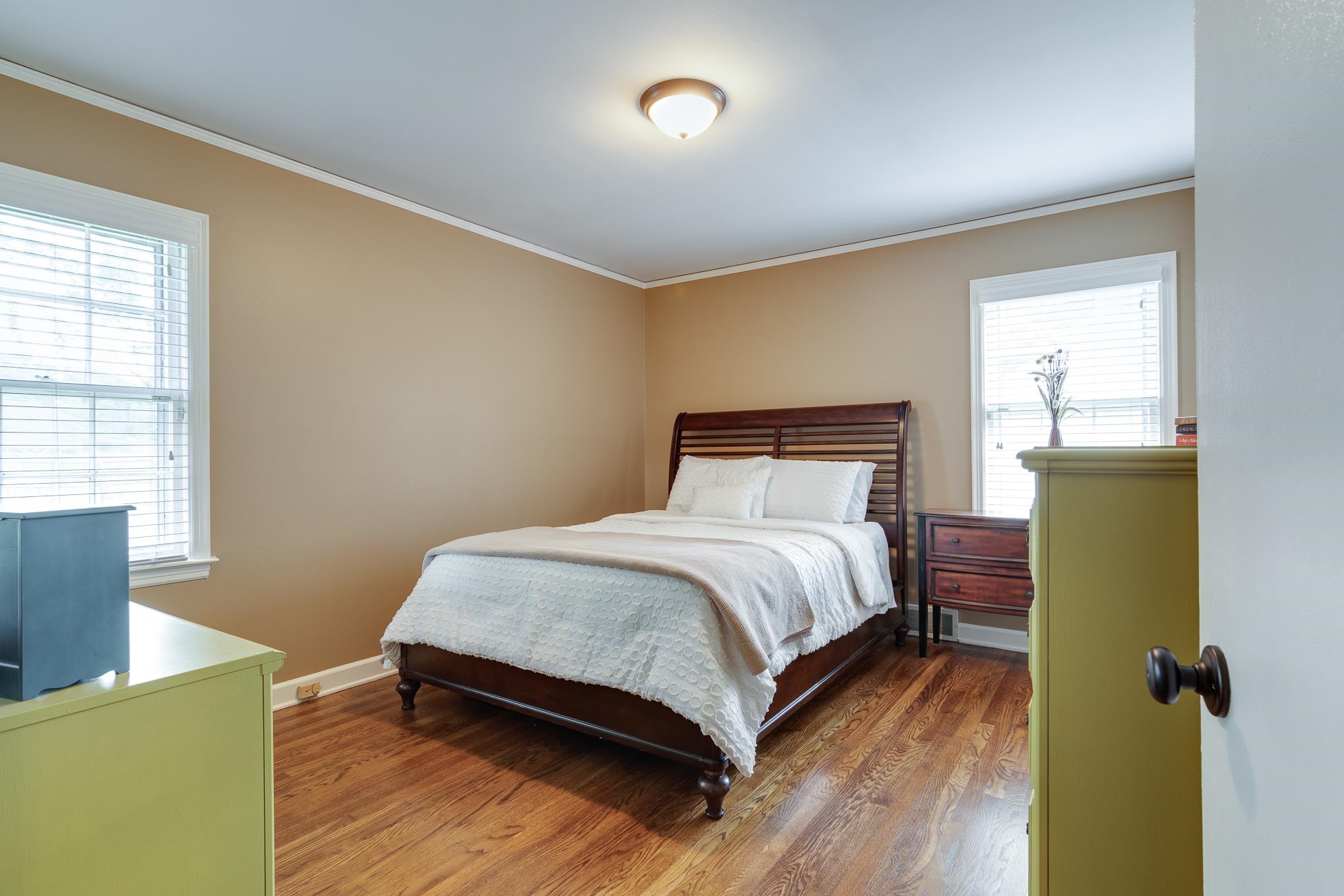 4892 Kaye Road Memphis, TN 38117 - Photo 10 of 17 a bedroom with a bed and wooden floor