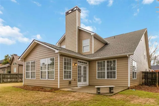 a view of a house with a swimming pool