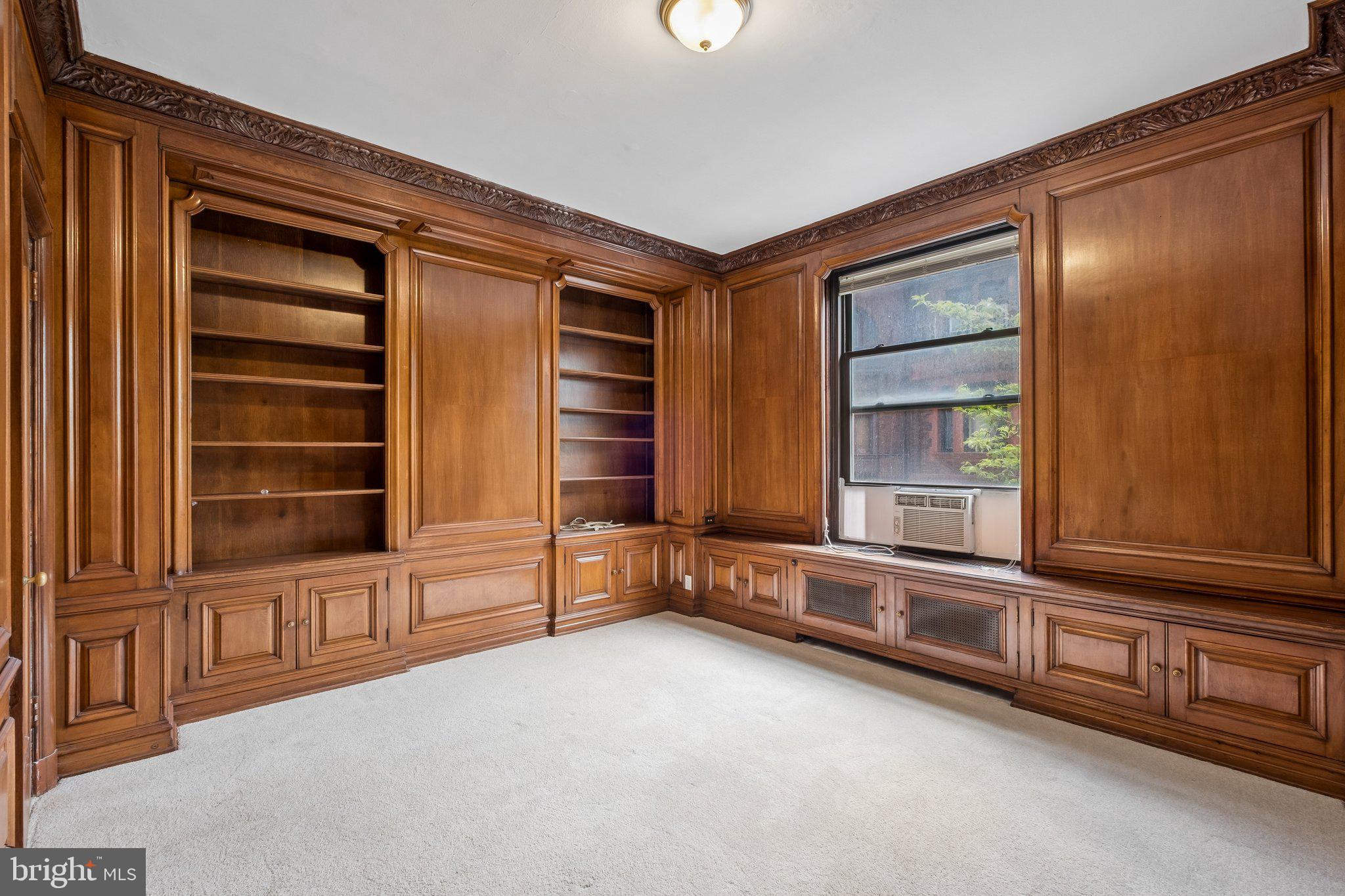 2031 Locust Street, Unit 101 Philadelphia, PA 19103 - Photo 10 of 23 an empty room with windows