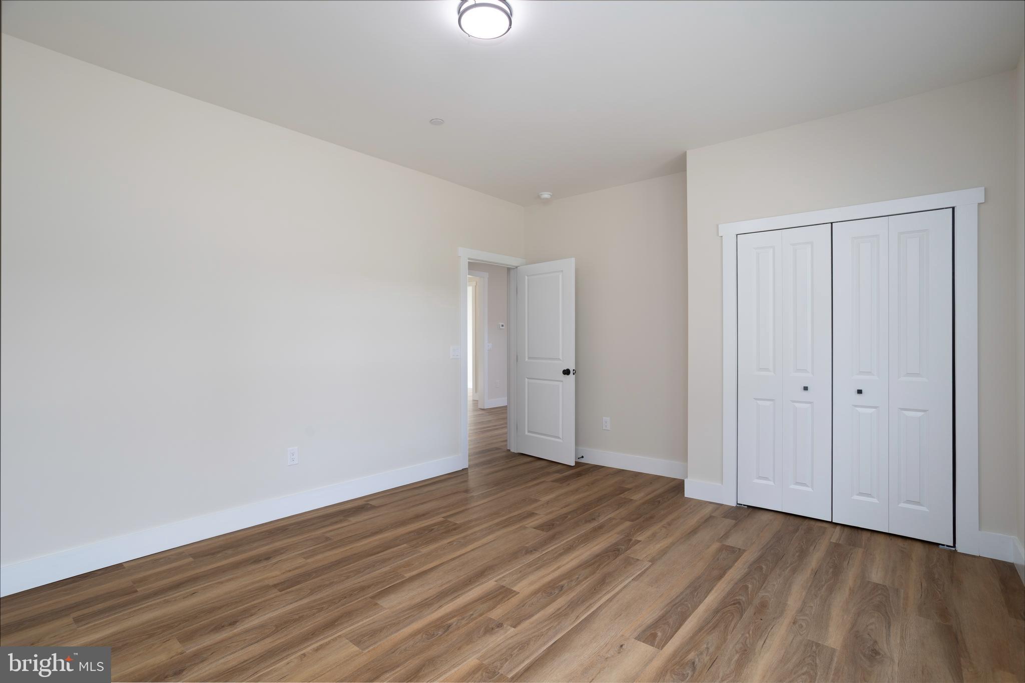 Clark Corner Road Centreville, MD 21617 - Photo 9 of 43 a view of an empty room with wooden floor