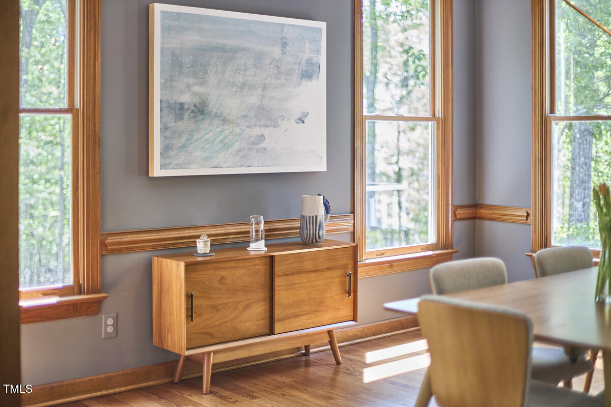 8407 Millers Bend Bahama, NC 27503 - Photo 20 of 77 a bedroom with furniture and a window
