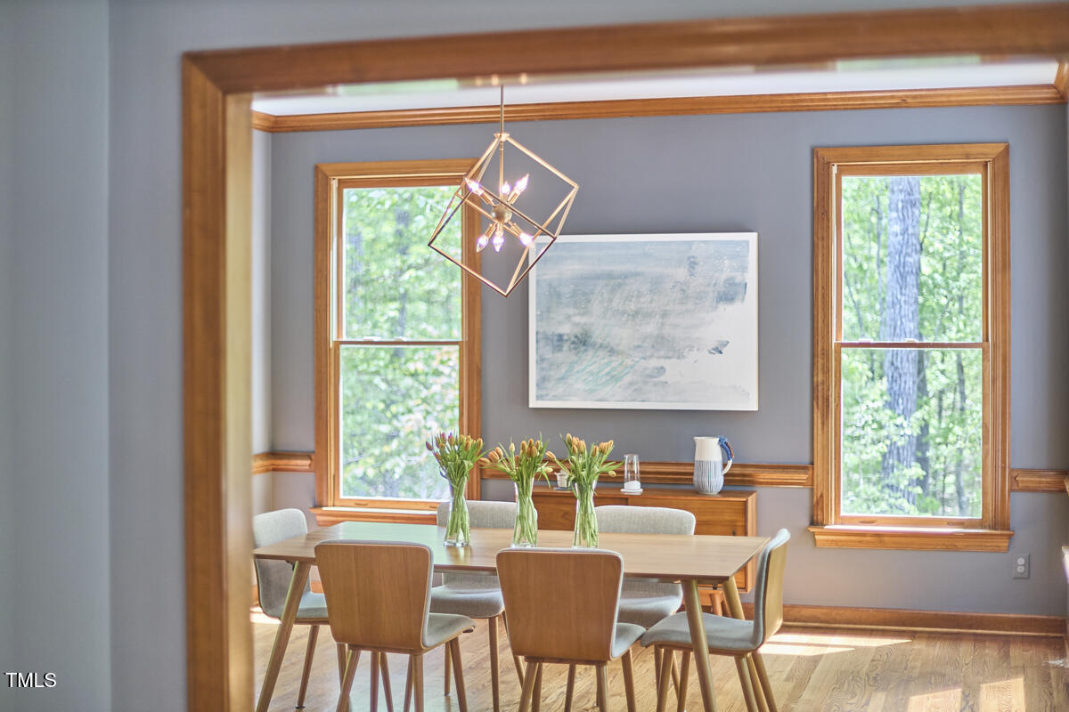 8407 Millers Bend Bahama, NC 27503 - Photo 21 of 77 a view of a dining room with furniture window and outside view