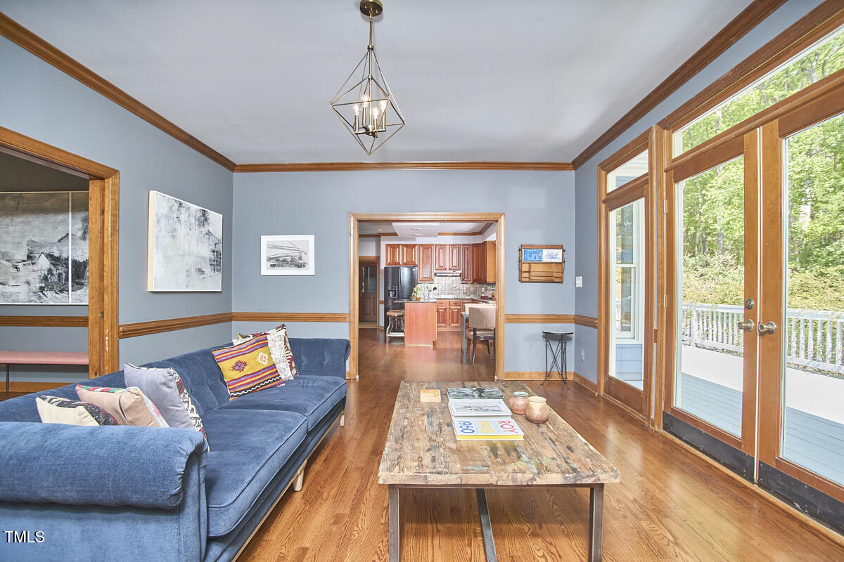 8407 Millers Bend Bahama, NC 27503 - Photo 23 of 77 a living room with furniture and a dining table