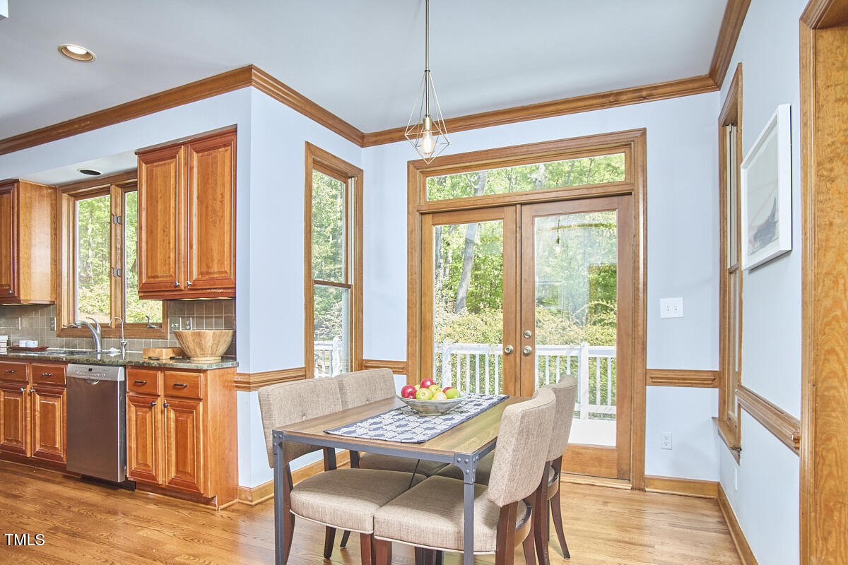 8407 Millers Bend Bahama, NC 27503 - Photo 34 of 77 a dining room with furniture and window