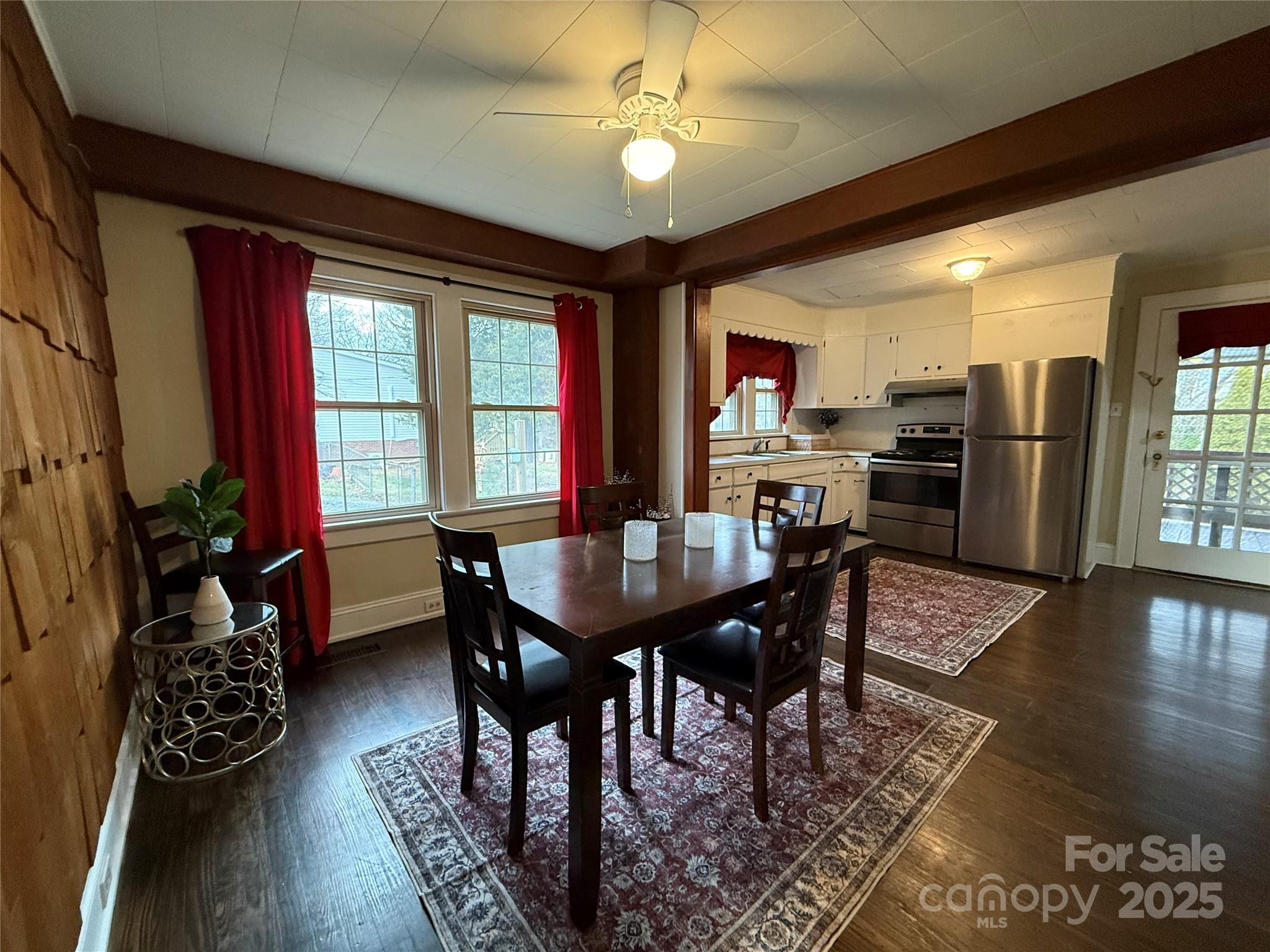 375 20th Avenue Northeast Hickory, NC 28601 - Photo 11 of 38 a view of a dining room with furniture window and wooden floor