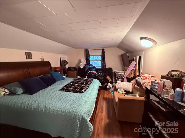 a bed room with bed and a couch