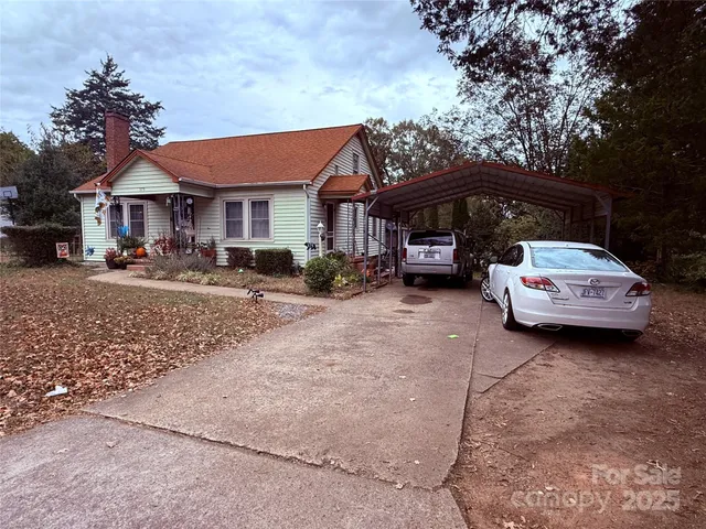 a car parked in front of a house