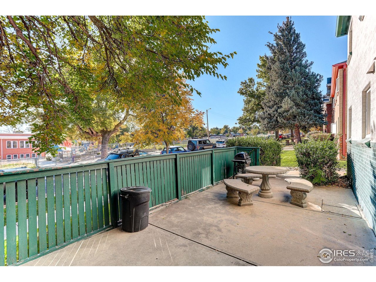 961 16th Street, Unit 5 Boulder, CO 80302 - Photo 14 of 19 a view of a table and chairs on the roof deck