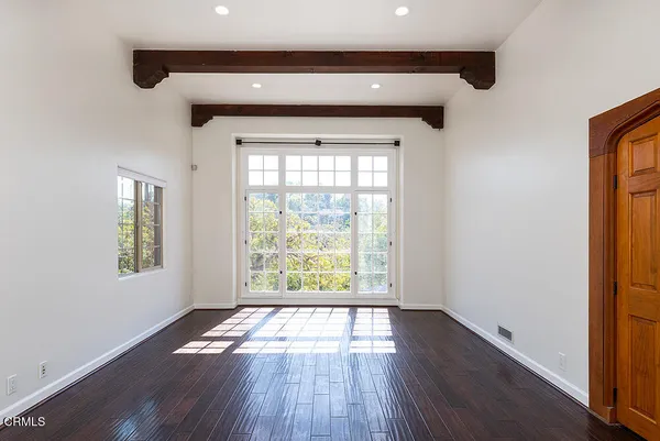 a picture of a bench in front of a building