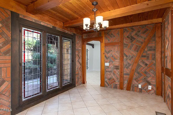 a kitchen with a stove and a refrigerator