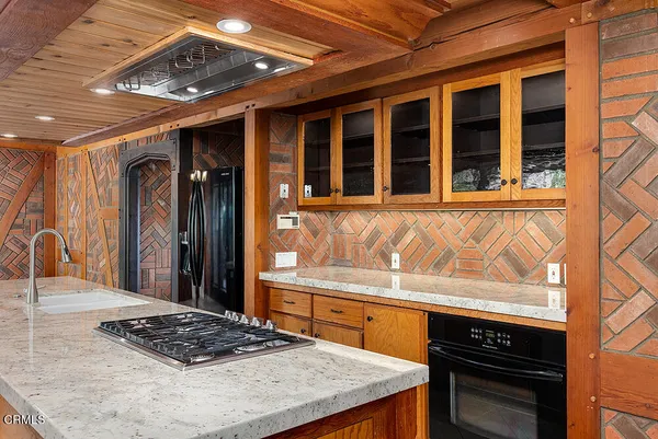 a view of hallway with wooden floor