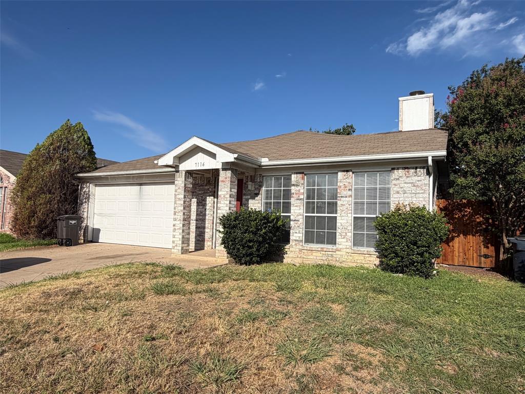 7116 Nohl Ranch Road Fort Worth, TX 76133 - Photo 2 of 10 Front view of home, 3 large windows into Living room