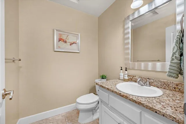 a bathroom with a toilet and a bathtub