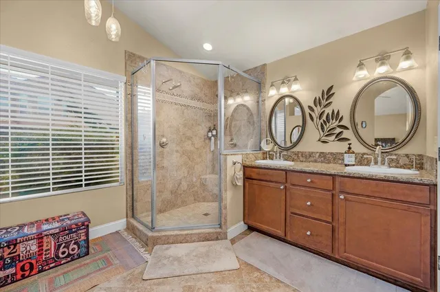 a view of backyard with green space and seating area