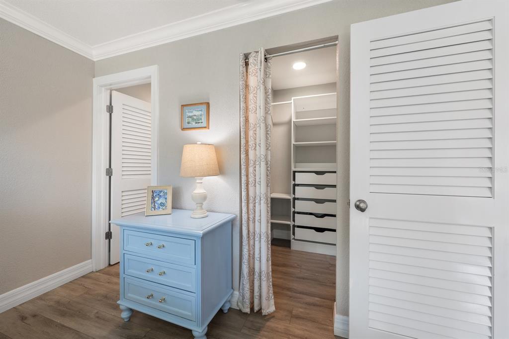 1701 Pinehurst Road, Unit 17G Dunedin, FL 34698 - Photo 12 of 30 a view of a hallway and closet with cabinet