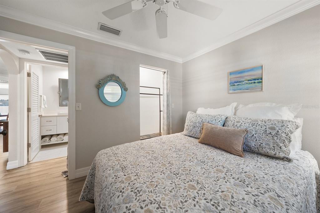 1701 Pinehurst Road, Unit 17G Dunedin, FL 34698 - Photo 15 of 30 a bedroom with a large bed and a window