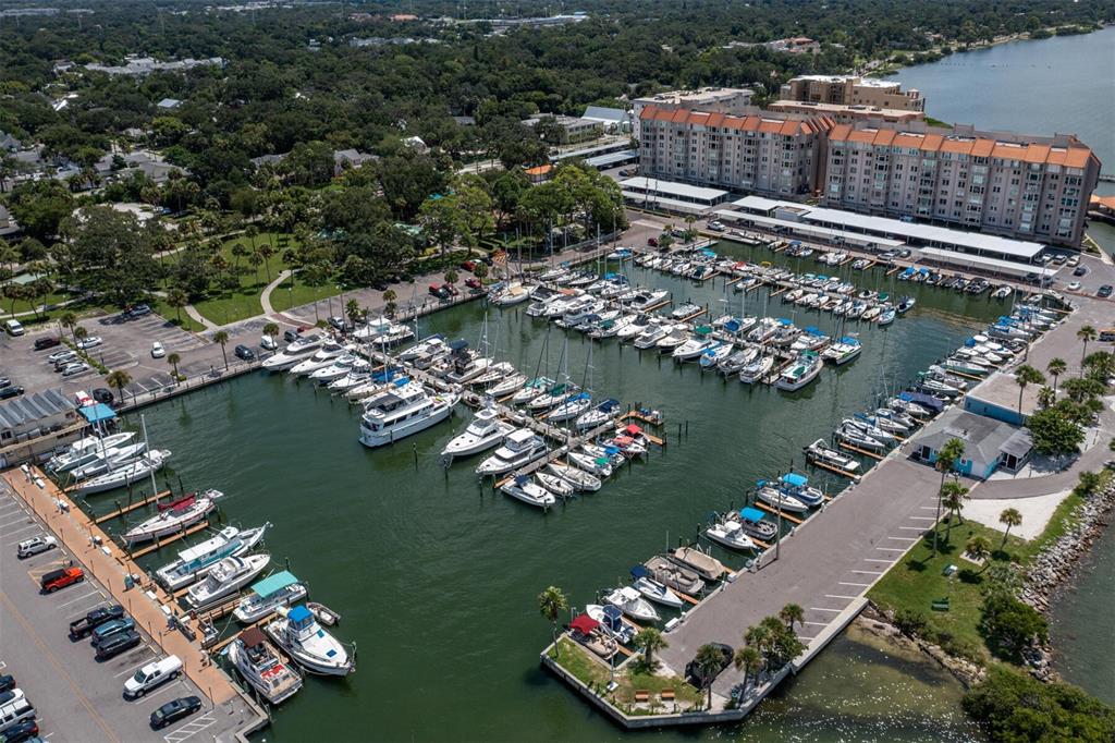 1701 Pinehurst Road, Unit 17G Dunedin, FL 34698 - Photo 28 of 30 an aerial view of a house roof deck with outdoor seating and city view