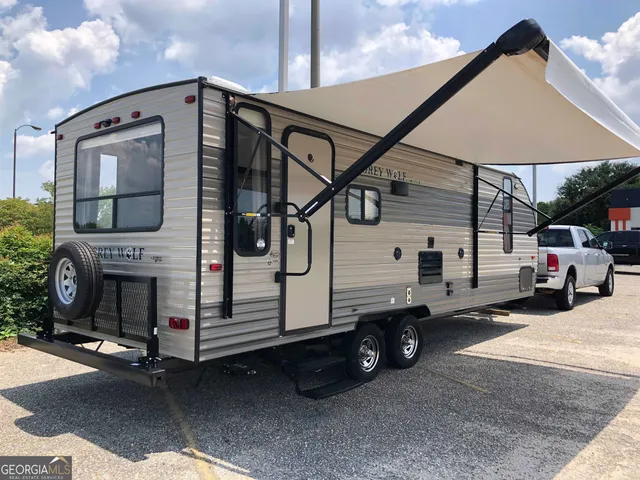 a view of a cars park in front of house