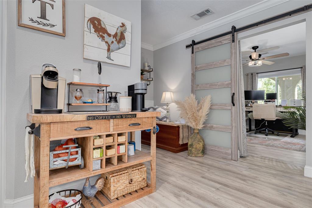 1868 Overview Drive New Port Richey, FL 34655 - Photo 11 of 69 a view of living room with furniture and wooden floor