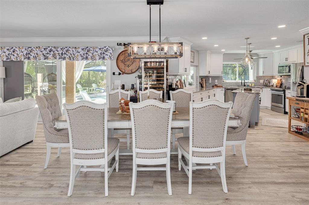 1868 Overview Drive New Port Richey, FL 34655 - Photo 16 of 69 a view of a dining room with furniture window and wooden floor