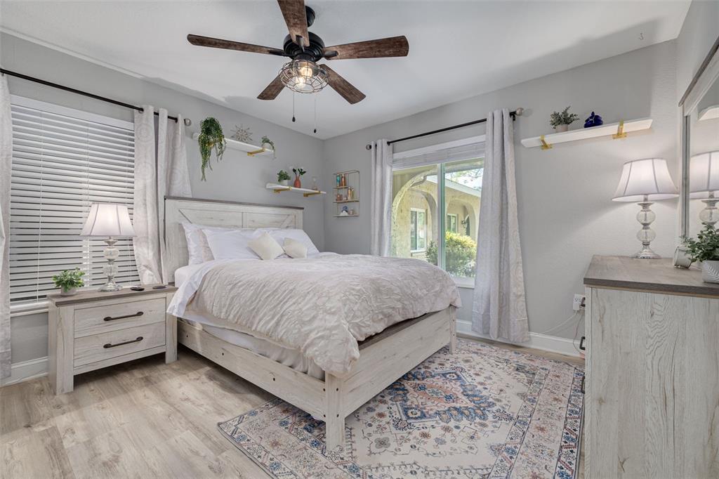 1868 Overview Drive New Port Richey, FL 34655 - Photo 30 of 69 a bedroom with a large bed and a window