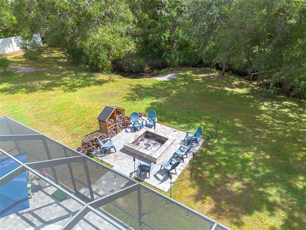 1868 Overview Drive New Port Richey, FL 34655 - Photo 51 of 69 a view of a swimming pool with a yard