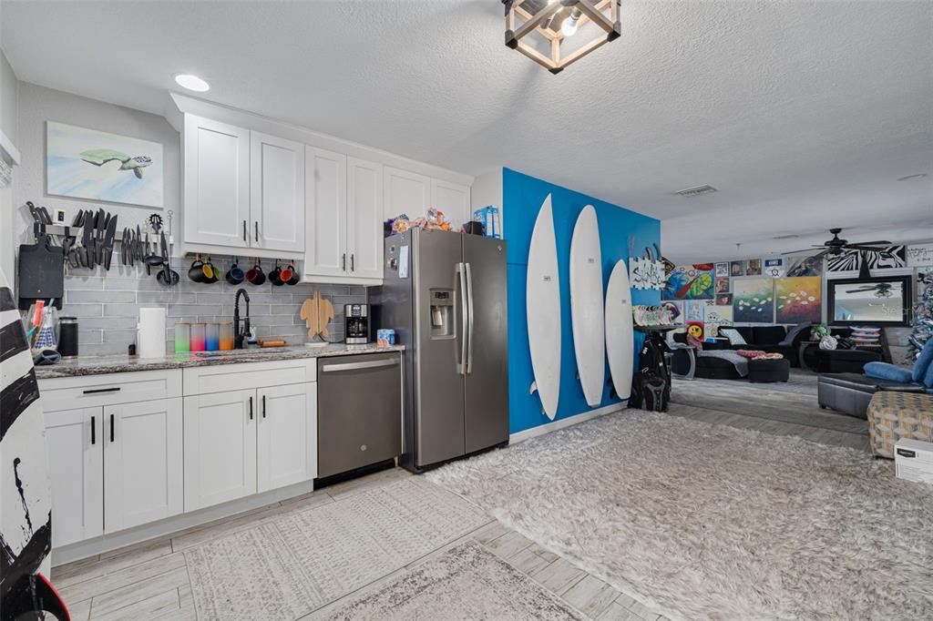 1868 Overview Drive New Port Richey, FL 34655 - Photo 54 of 69 a kitchen with refrigerator and window