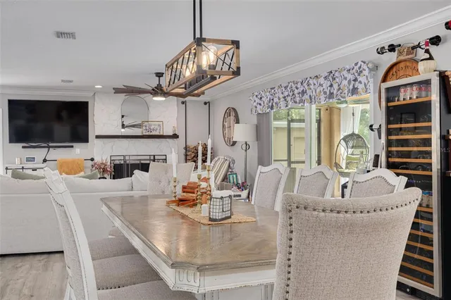 a kitchen with granite countertop a table and chairs