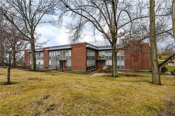 a view of a yard in the snow