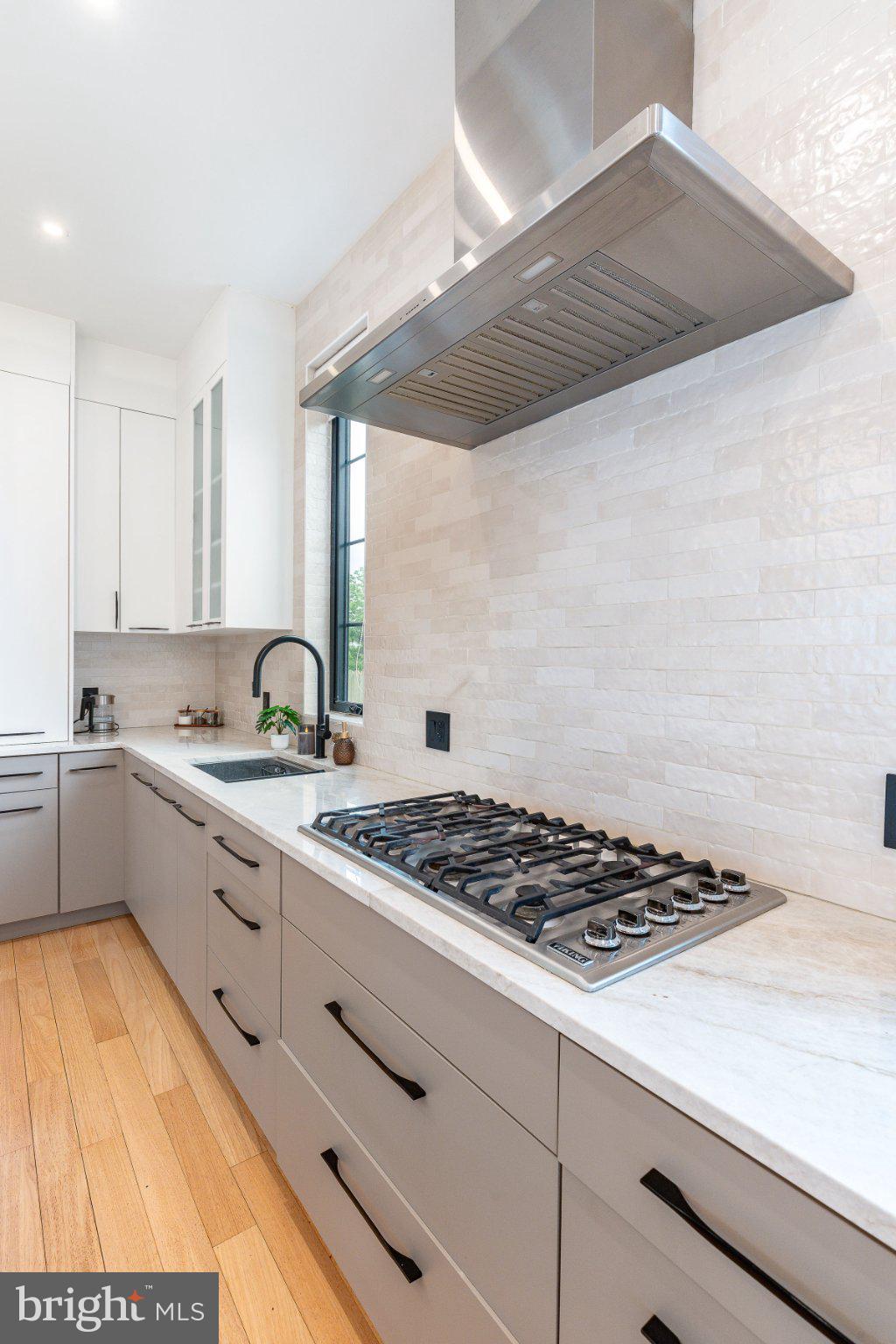 9739 Krewstown Road Philadelphia, PA 19115 - Photo 14 of 84 Sleek modern kitchen with elegant finishes.