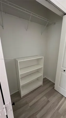 a view of an empty walk in closet