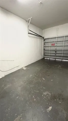 a view of a room with an empty space