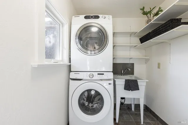 a utility room with dryer and washer