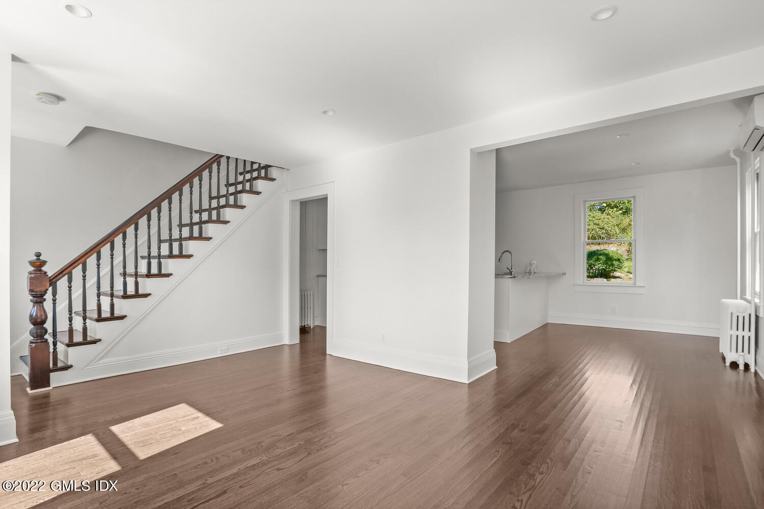 19 Division Street Greenwich, CT 06830 - Photo 2 of 16 a view of entryway with wooden floor
