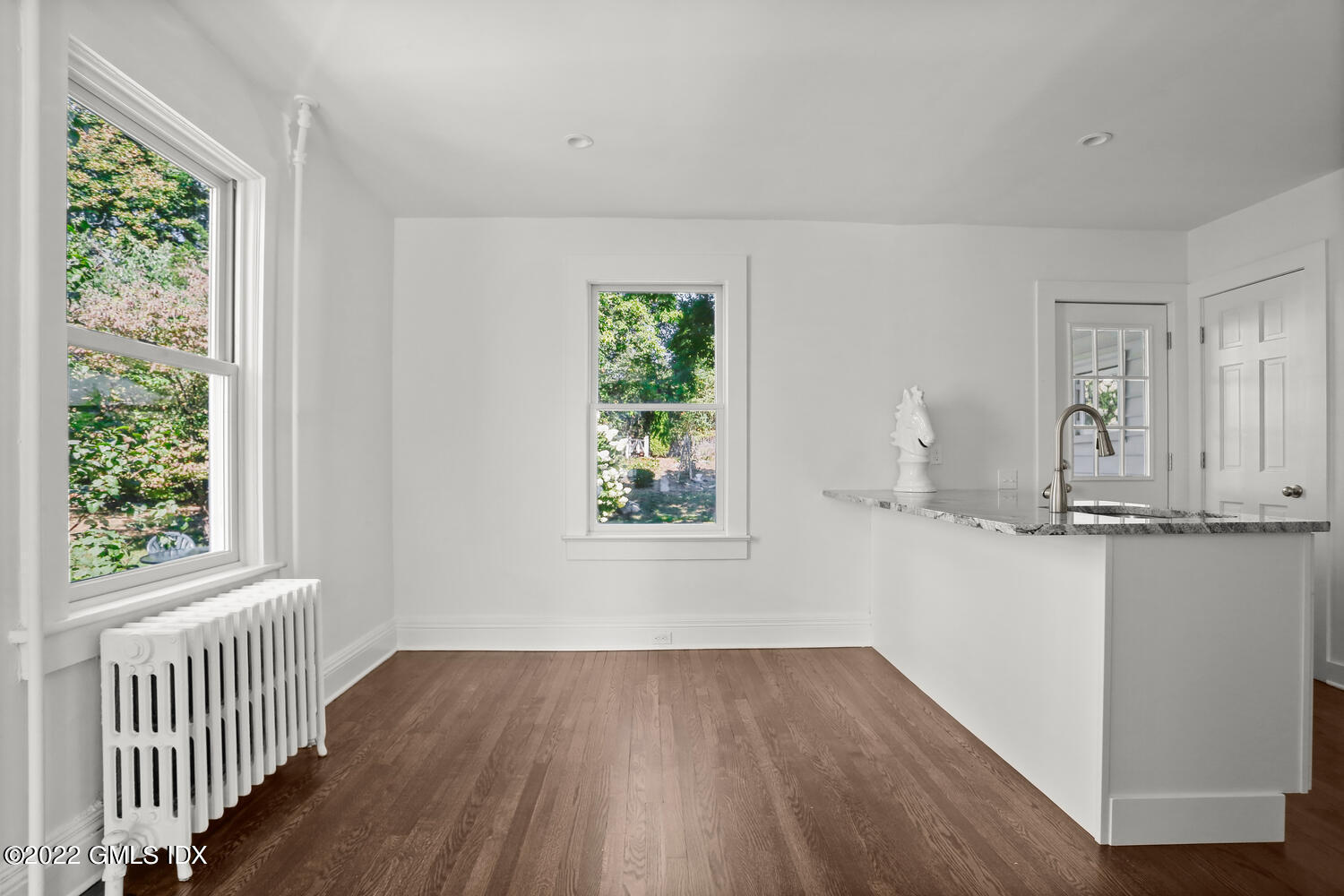 19 Division Street Greenwich, CT 06830 - Photo 4 of 16 a very nice looking room with wooden floor and windows